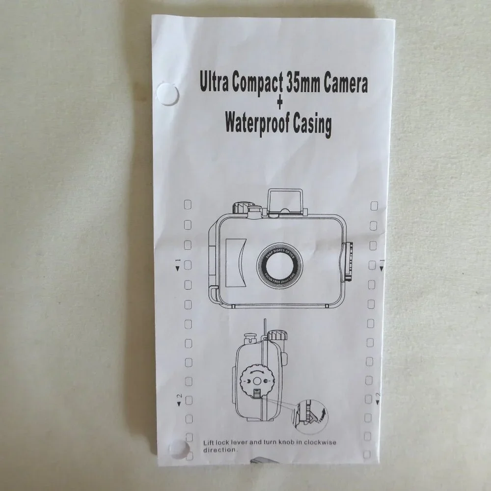 USED ONCE WATERPROOF SPORT UTILITY COMPACT 35mm CAMERA IN CASING